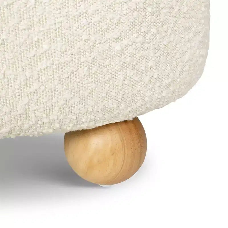 Pouf rotondo contenitore con coperchio sollevabile e piedini in legno a sfera
