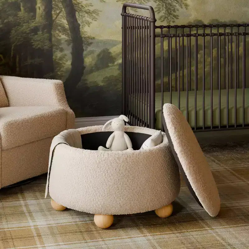 Pouf rotondo contenitore con coperchio sollevabile e piedini in legno a sfera